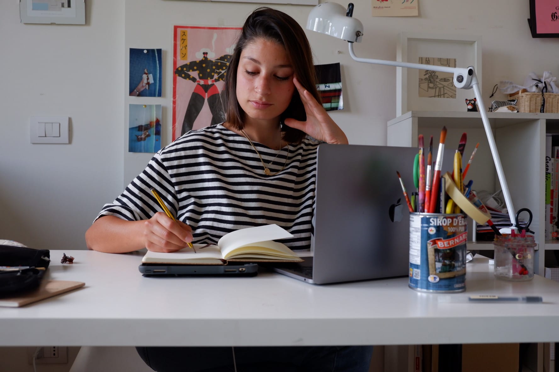 Elena Scilinguo, Marketing Designer at Penpot, at her home workspace